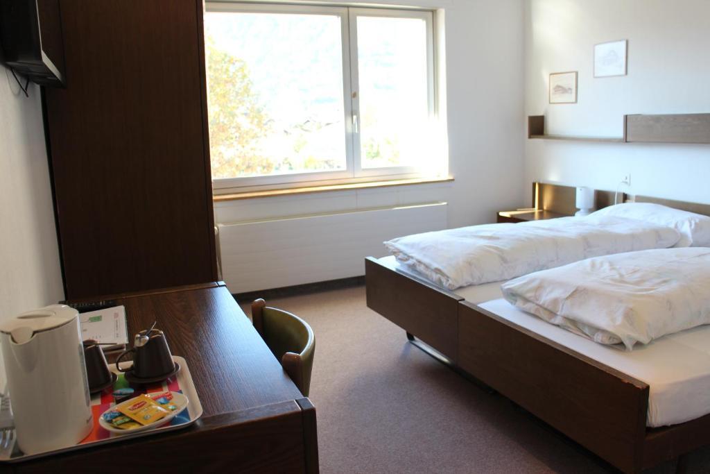 Bahnhof Hotel Interlaken Quarto foto